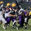 Lemoore's Cory Whitmore runs for a short game Friday night against Hanford. 